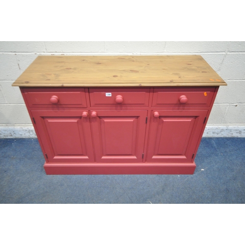 1288 - A PARTIALLY RED PAINTED SIDEBOARD, fitted with three drawers over three cupboard doors, length 122cm... 