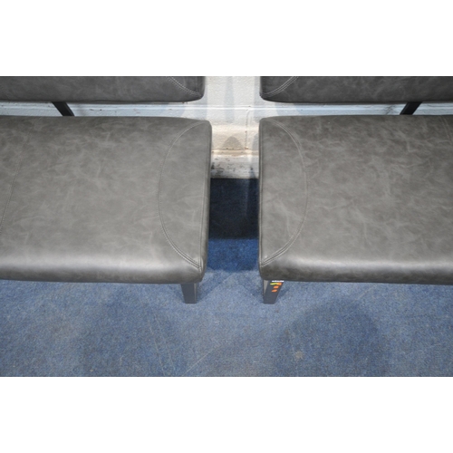 1297 - A PAIR OF CHARCOAL GREY LEATHER UPHOLSTERED BENCHES, with two handles to backrest, raised on metal l... 