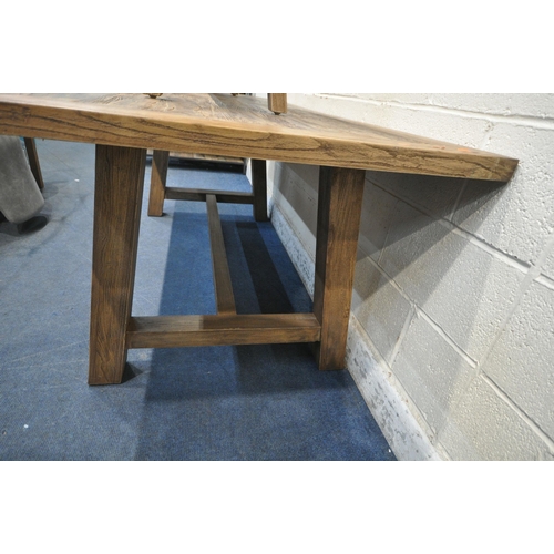 1302 - A MODERN RECTANGLAR FARMHOUSE STYLE TABLE, raised on block legs, united by stretchers, length 211cm ... 