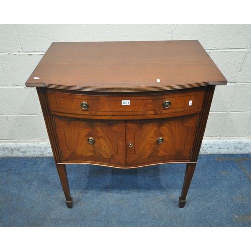 1316 - A 20TH CENTURY MAHOGANY SERPENTINE SIDE TABLE, with a single drawer, above double cupboard doors, ra... 