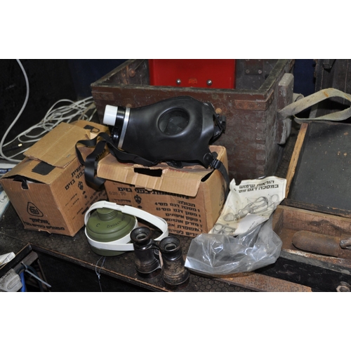 1085 - TWO VINTAGE WOODEN TOOLBOXES  CONTAINING TOOLS including two gas masks, a 17in wooden smoothing plan... 