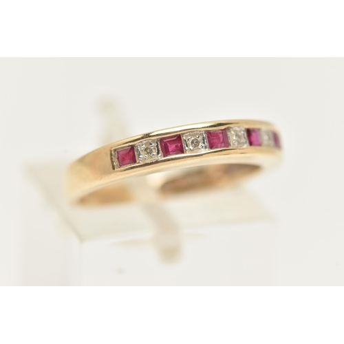 17 - A 9CT GOLD RUBY AND DIAMOND NINE STONE RING, designed as five square cut rubies interspaced by singl... 