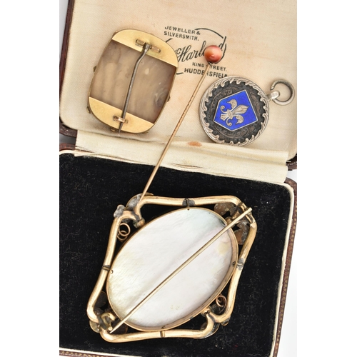 23 - FOUR ITEMS OF JEWELLERY, to include a late Victorian rectangular hardstone brooch, a late Victorian ... 