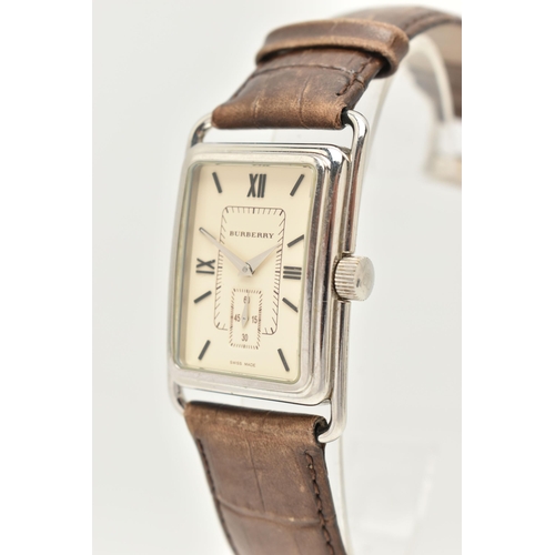 28 - A GENTLEMAN'S BURBERRY WRISTWATCH, the rectangular cream coloured face with Roman numerals, a subsid... 