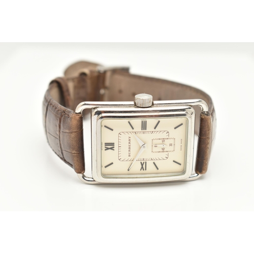 28 - A GENTLEMAN'S BURBERRY WRISTWATCH, the rectangular cream coloured face with Roman numerals, a subsid... 