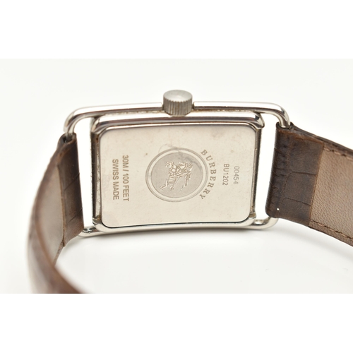 28 - A GENTLEMAN'S BURBERRY WRISTWATCH, the rectangular cream coloured face with Roman numerals, a subsid... 