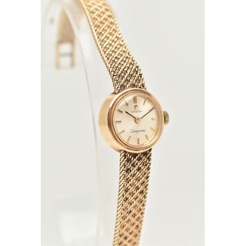 31 - A LADIES 9CT GOLD 'OMEGA' WRISTWATCH, manual wind, round silver dial signed 'Omega, Ladymatic', bato... 