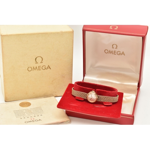 31 - A LADIES 9CT GOLD 'OMEGA' WRISTWATCH, manual wind, round silver dial signed 'Omega, Ladymatic', bato... 