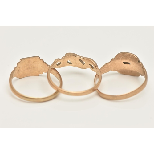 4 - THREE 9CT GOLD RINGS, to include two signet style rings and a ring designed as a central diagonal pa... 