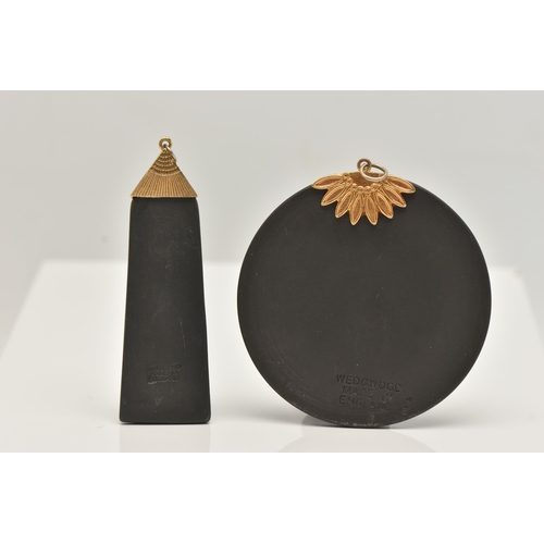 54 - TWO LARGE 'WEDGWOOD' PENDANTS, the first a circular form black basalt pedant depicting Medusa, appro... 