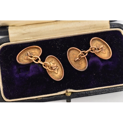 64 - A PAIR OF 15CT GOLD CUFFLINKS, oval form cufflinks with acanthus detail, chain link fittings, hallma... 