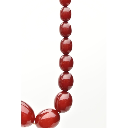 7 - A BAKELITE BEAD NECKLACE, comprising thirty-seven beads, measuring approximately 7.5mm to 22mm, appr... 