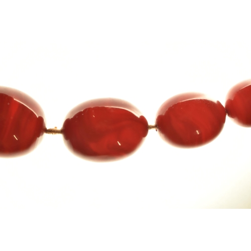 7 - A BAKELITE BEAD NECKLACE, comprising thirty-seven beads, measuring approximately 7.5mm to 22mm, appr... 