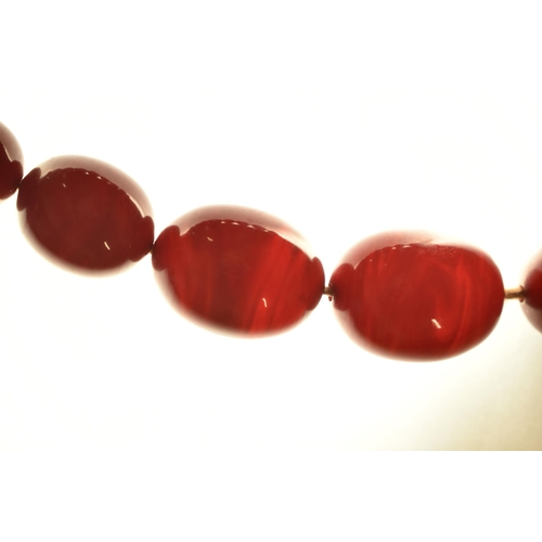 7 - A BAKELITE BEAD NECKLACE, comprising thirty-seven beads, measuring approximately 7.5mm to 22mm, appr... 