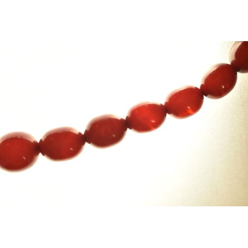 7 - A BAKELITE BEAD NECKLACE, comprising thirty-seven beads, measuring approximately 7.5mm to 22mm, appr... 