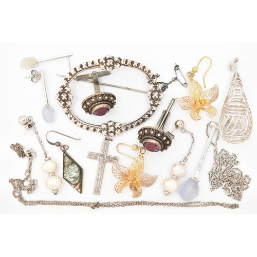 77 - A SMALL ASSORTMENT OF JEWELLERY, to include a large brooch, a large open work pendant, filigree earr... 