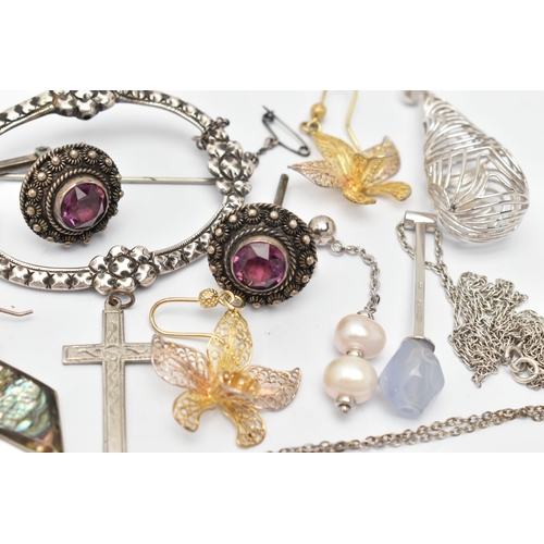 77 - A SMALL ASSORTMENT OF JEWELLERY, to include a large brooch, a large open work pendant, filigree earr... 