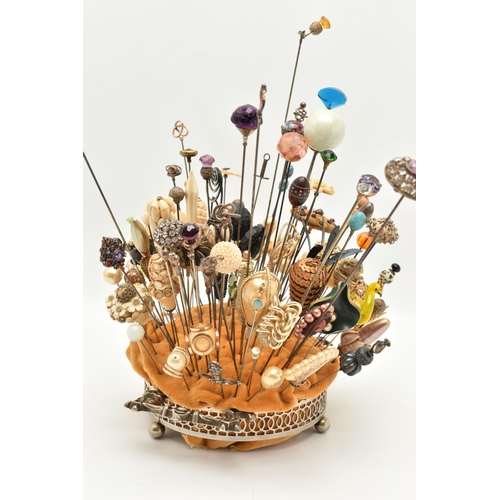 120 - A COLLECTION OF HAT PINS, approximately ninety six hat pins of varying designs, to include eight sil... 