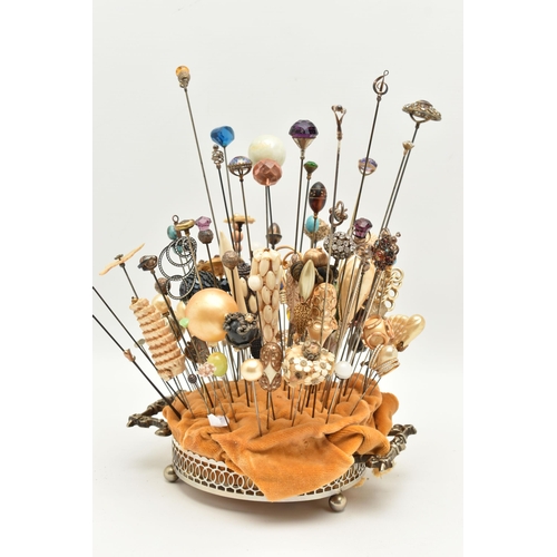 120 - A COLLECTION OF HAT PINS, approximately ninety six hat pins of varying designs, to include eight sil... 