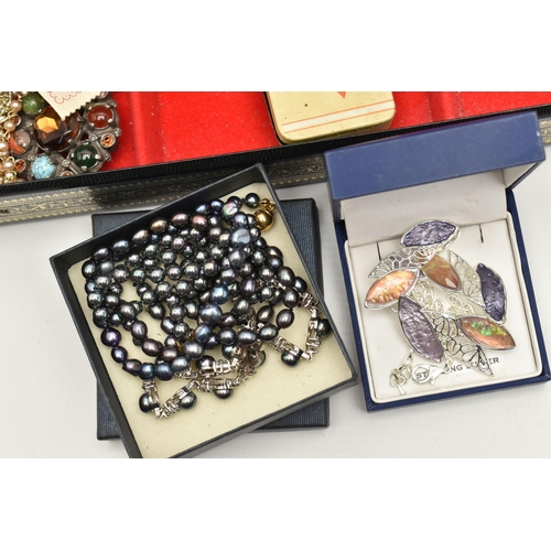 126 - A BOX OF ASSORTED JEWELLERY, to include a white metal disk pendant, stamped silver, a hard stone and... 