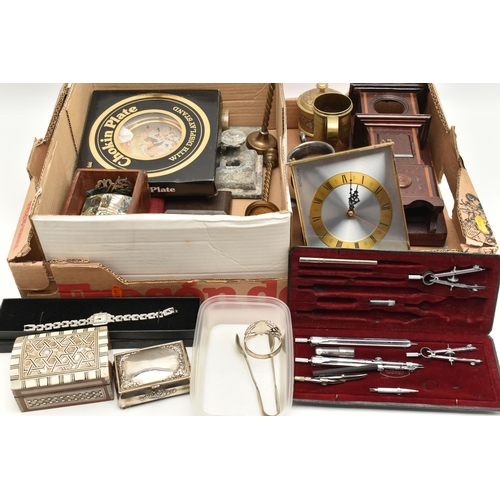 129 - A BOX OF ASSORTED ITEMS, to include a mantle clock, a chokin plate, a pair of candle sticks, tankard... 