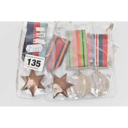 135 - FOUR MILITARY MEDALS, to include a pair of WWII war and defence medals and two star medals