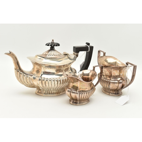 95 - A GEORGE V THREE PIECE SILVER TEA SET, to include a tea pot, a sugar pot and milk jug, detailed with... 