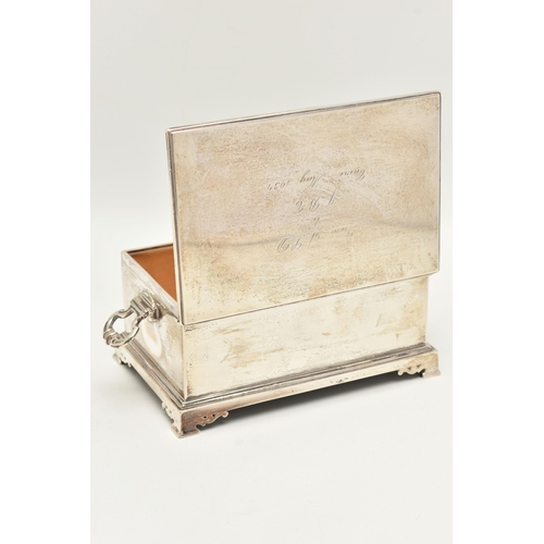 96 - A GEORGE V SILVER CIGAR BOX, rectangular form, raised on four bracket feet, two knopped handles to t... 