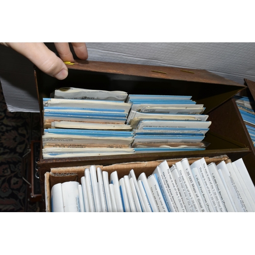 555 - THREE BOXES AND TWO METAL CONTAINERS OF 1960S ORDNANCE SURVEY '2.5 INCH MAPS', approximately three h... 