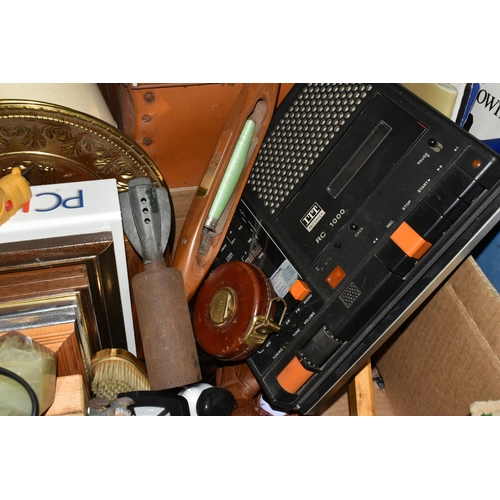 556 - TWO BOXES AND LOOSE MISCELLANEOUS SUNDRIES, to include a vintage style radio alarm clock, an ITT tap... 