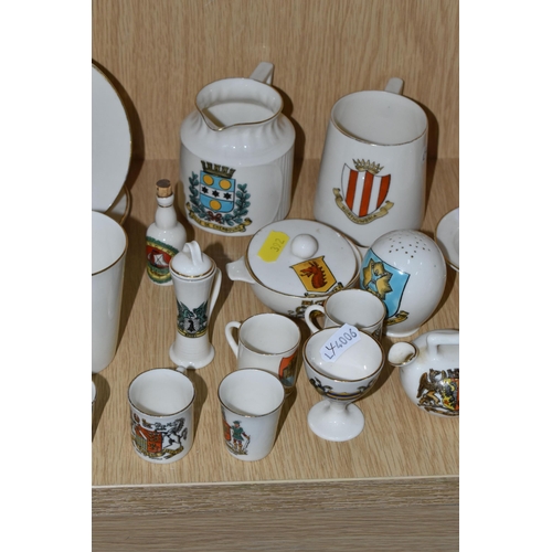 392 - A QUANTITY OF WH GOSS CRESTED WARE AND OTHER VESSELS, over sixty pieces, to include a marmalade pot ... 