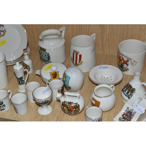 392 - A QUANTITY OF WH GOSS CRESTED WARE AND OTHER VESSELS, over sixty pieces, to include a marmalade pot ... 