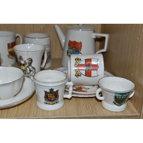 392 - A QUANTITY OF WH GOSS CRESTED WARE AND OTHER VESSELS, over sixty pieces, to include a marmalade pot ... 