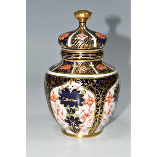 324 - A ROYAL CROWN DERBY IMARI 1128 COVERED VASE, of shouldered form, red printed backstamp and date cyph... 