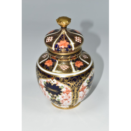 324 - A ROYAL CROWN DERBY IMARI 1128 COVERED VASE, of shouldered form, red printed backstamp and date cyph... 