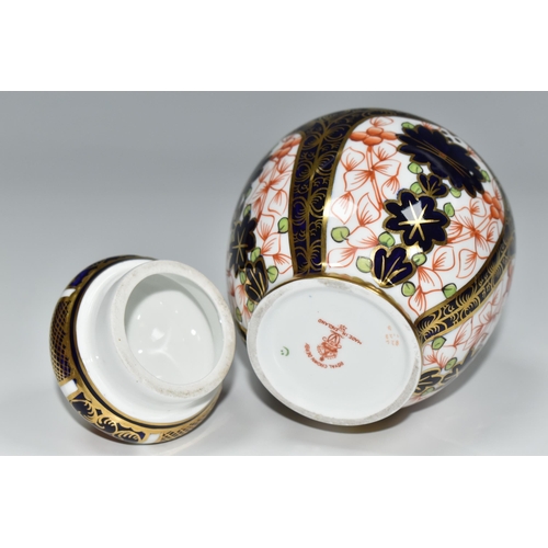 324 - A ROYAL CROWN DERBY IMARI 1128 COVERED VASE, of shouldered form, red printed backstamp and date cyph... 