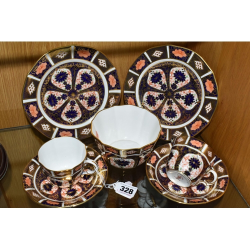 328 - SEVEN PIECES OF ROYAL CROWN DERBY IMARI 1128 TEA WARE, comprising two teacups, two saucers, two tea ... 