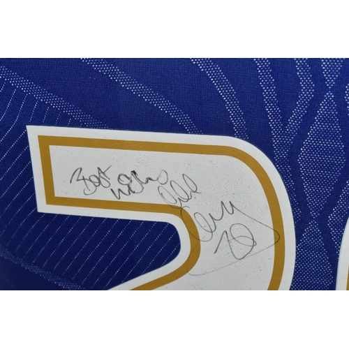 335 - TWO FRAMED AND GLAZED SIGNED BIRMINGHAM CITY HOME FOOTBALL SHIRTS, one signed by Lee Carsley, the ot... 