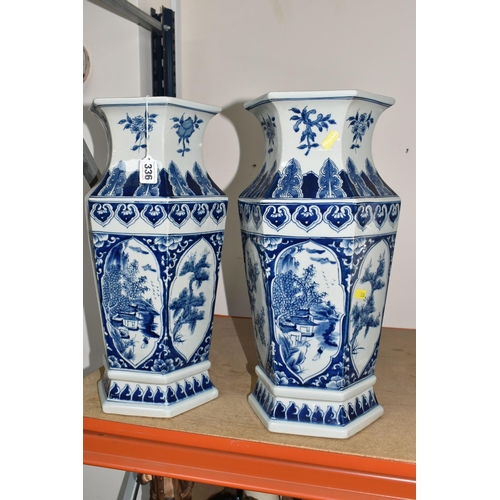 336 - TWO LARGE HEXAGONAL BLUE AND WHITE CHINESE VASES, decorated with pine trees, blossom and mountainsid... 