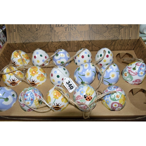 340 - A GROUP OF EMMA BRIDGEWATER AND SIMILIAR EASTER GIFT TINS, comprising sixteen egg shaped tins, four ... 