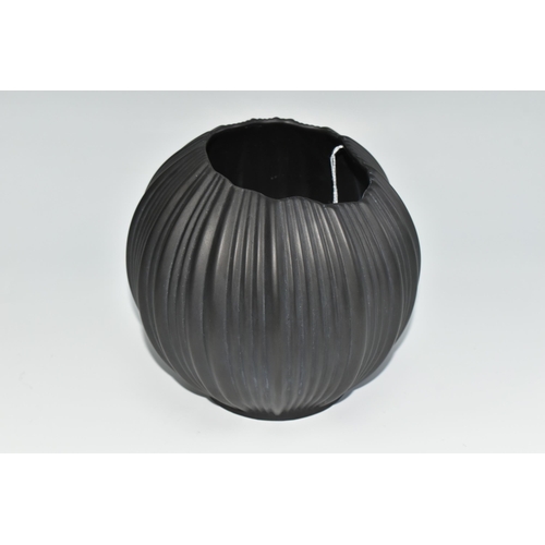 370 - A KAISER PORCELAIN VASE, no 285, the black spherical ridged vase of organic form, designed by Manfre... 