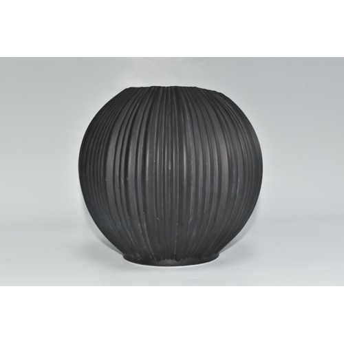 370 - A KAISER PORCELAIN VASE, no 285, the black spherical ridged vase of organic form, designed by Manfre... 