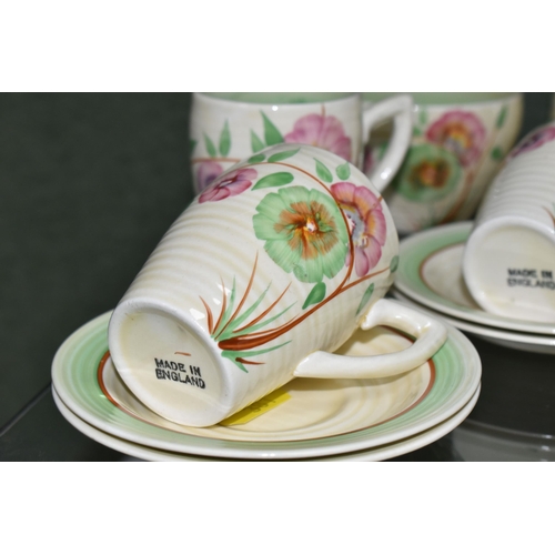 381 - A FIFTEEN PIECE CLARICE CLIFF 'COROLLA' PATTERN COFFEE SET, for Wilkinsons Ltd, in the Lynton shape,... 