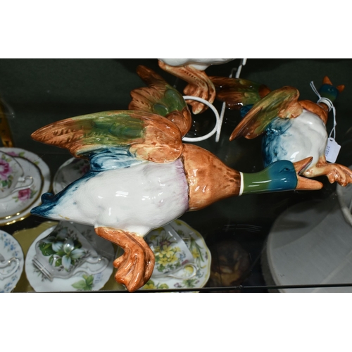 382 - A SET OF THREE BESWICK FLYING DUCK WALL PLAQUES, comprising model numbers 596-0, 596-1 (wing repaire... 