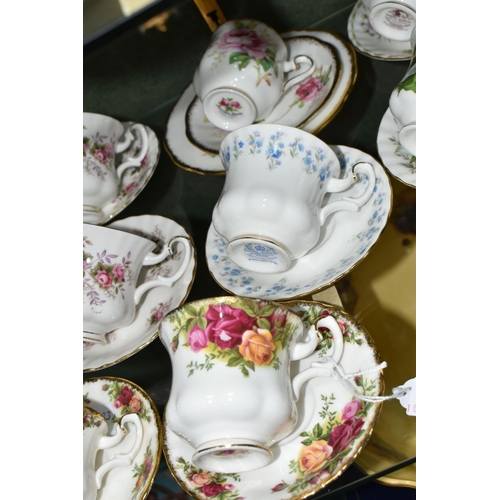 384 - A COLLECTION OF ROYAL ALBERT TEACUPS AND SAUCERS, in various patterns to include Old Country Roses, ... 