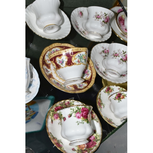 384 - A COLLECTION OF ROYAL ALBERT TEACUPS AND SAUCERS, in various patterns to include Old Country Roses, ... 