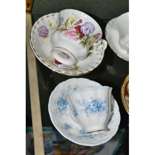 384 - A COLLECTION OF ROYAL ALBERT TEACUPS AND SAUCERS, in various patterns to include Old Country Roses, ... 