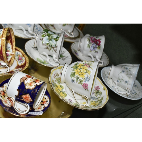 384 - A COLLECTION OF ROYAL ALBERT TEACUPS AND SAUCERS, in various patterns to include Old Country Roses, ... 