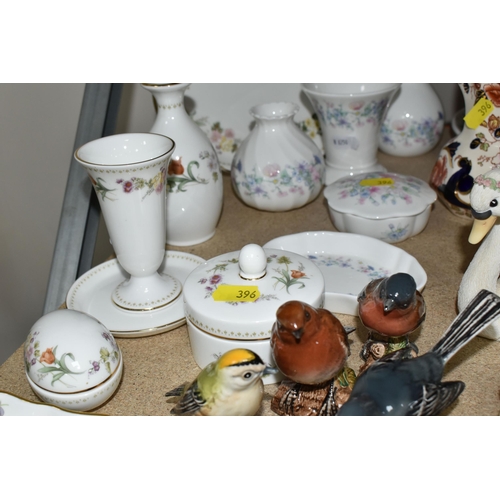 396 - A GROUP OF COLLECTABLE ORNAMENTS FROM NAMED MANUFACTURERS to include six Beswick birds comprising Wr... 