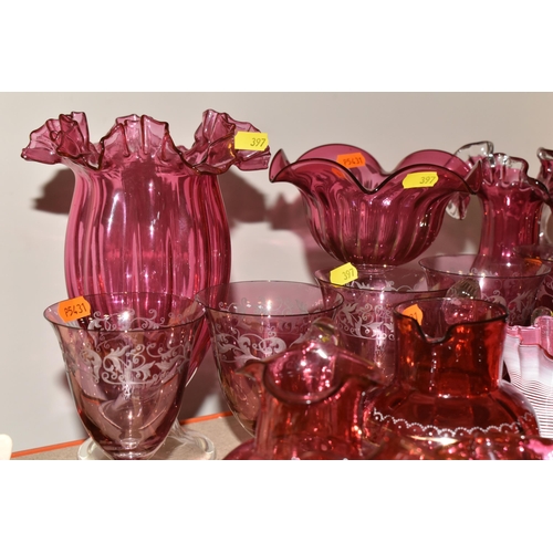 397 - A COLLECTION OF CRANBERRY GLASS to include six etched wine glasses, a quantity of Mary Gregory style... 